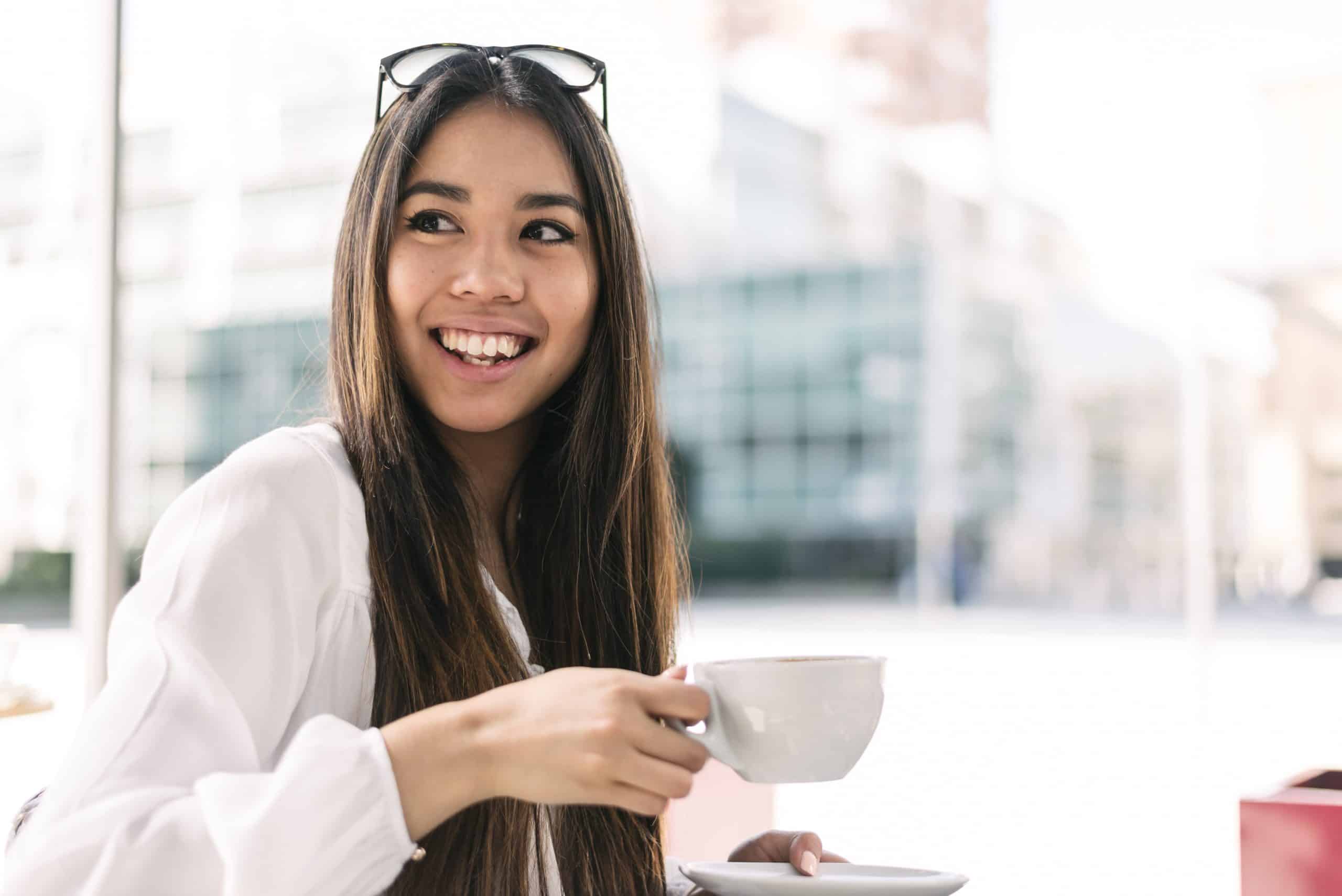young woman close up portrait with coffee 84CJWNQ scaled Smile Dentist Toronto